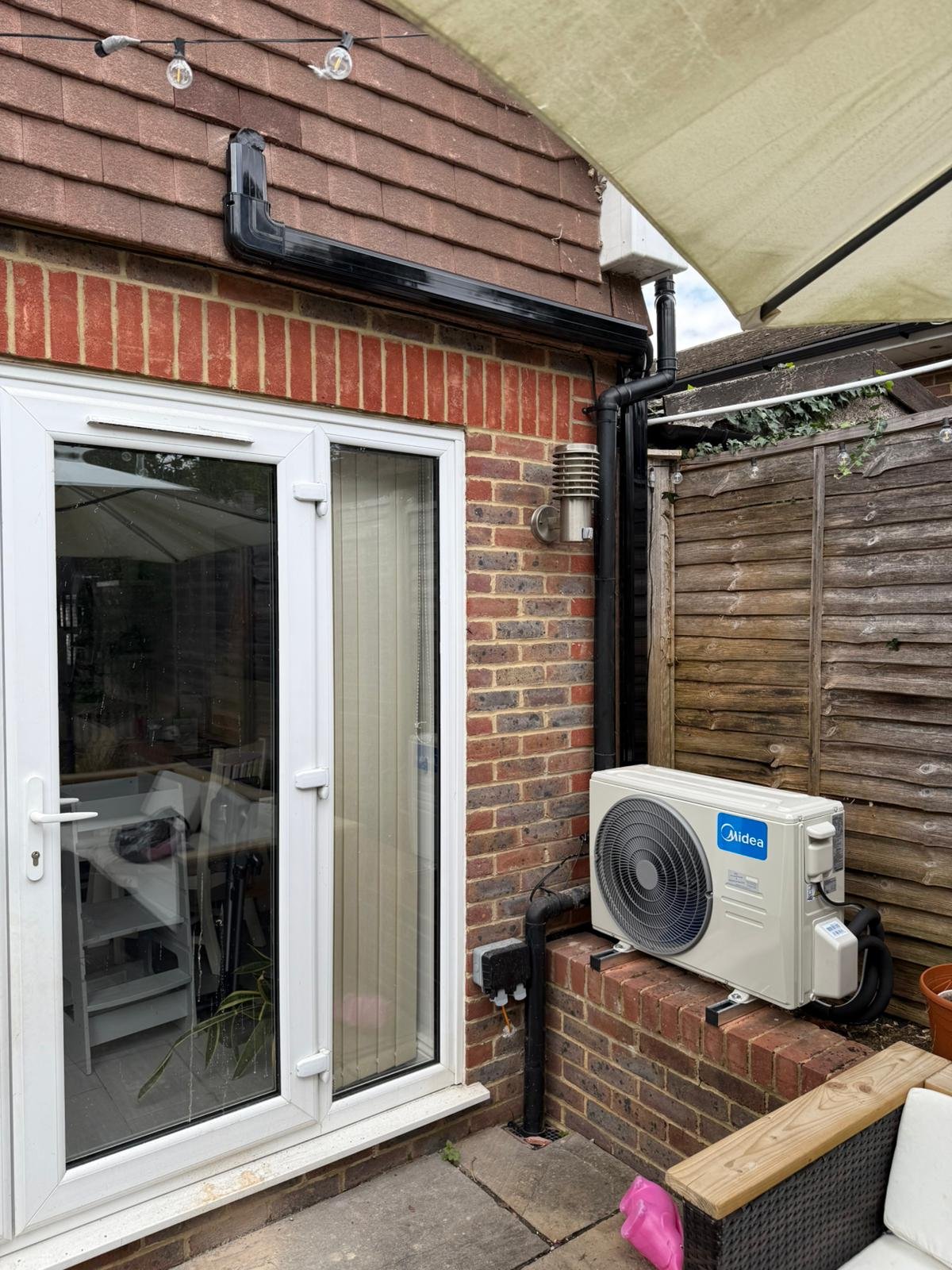 Residential outdoor air conditioning unit by PDQ Air Conditioning