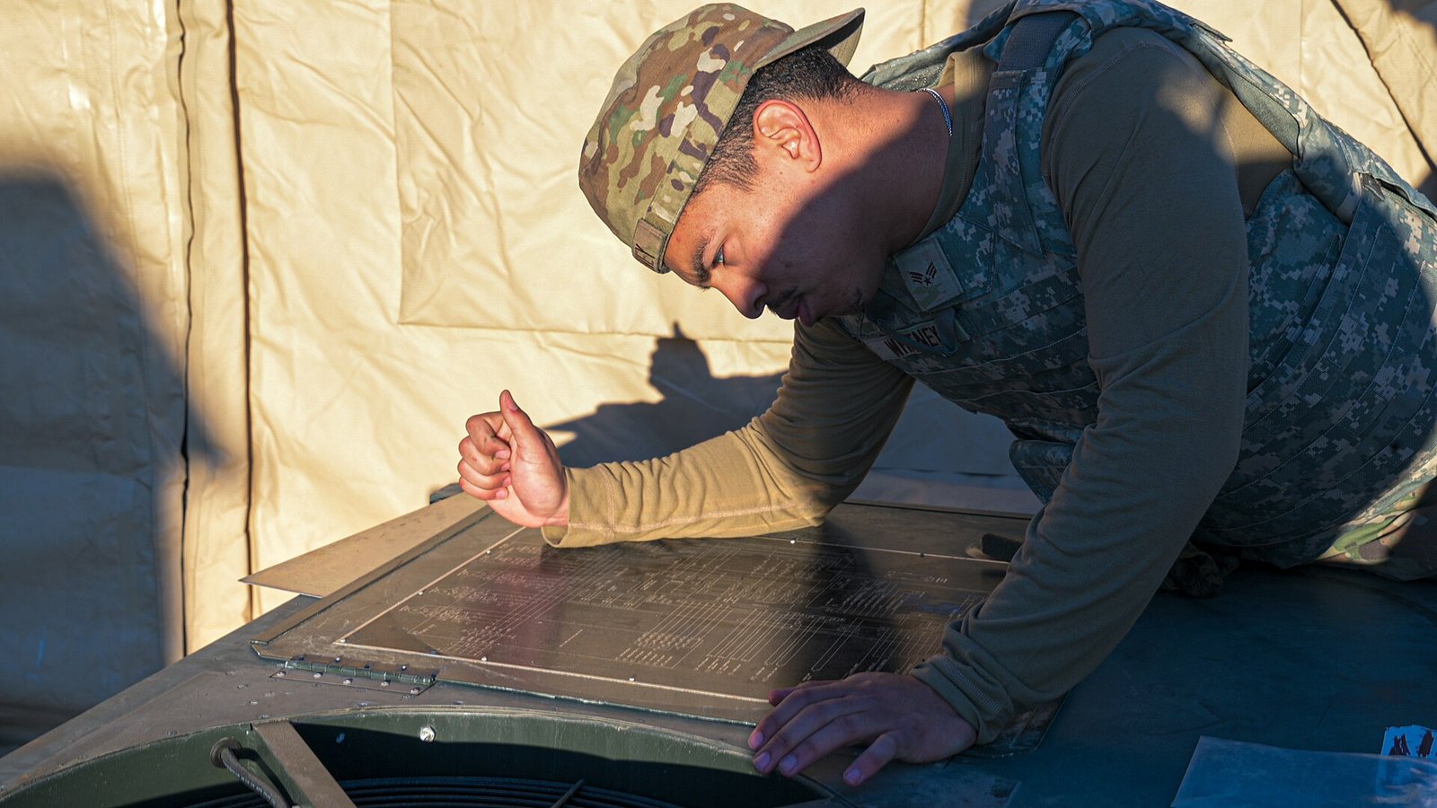 HVAC technician servicing equipment